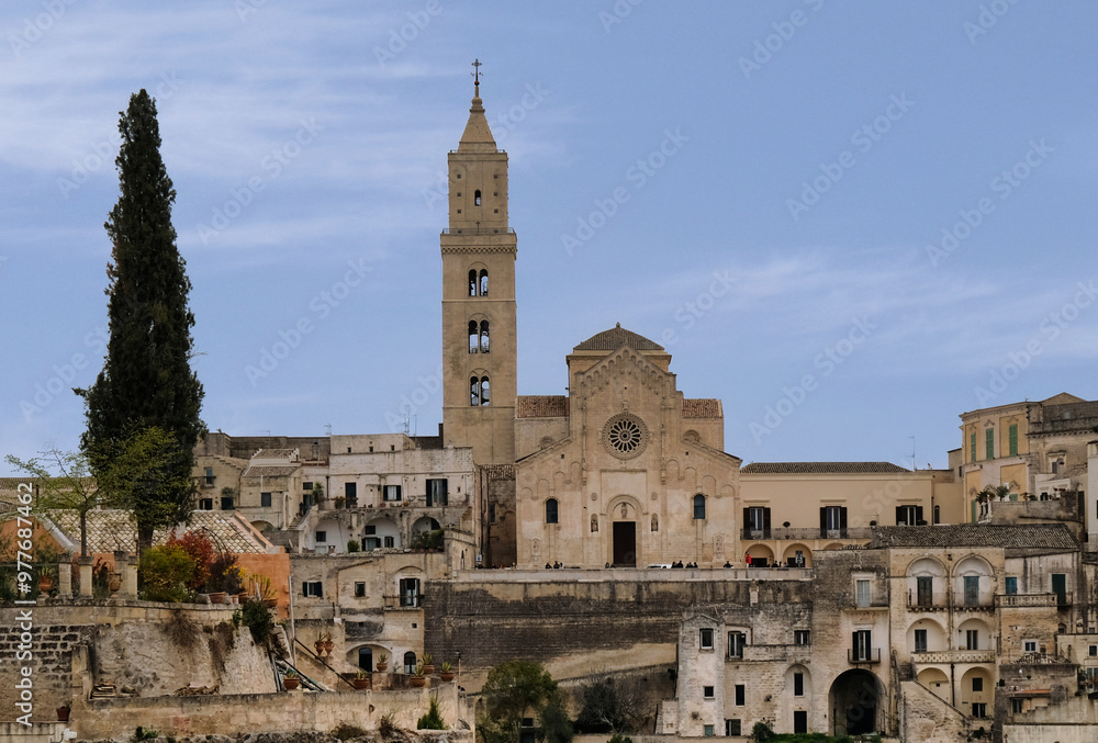 Fototapeta premium An overview of the beautiful city of Matera (Italy) in the background of the Cathedral of Matera the symbol of the city. , recognizable for its Romanesque style facade.
