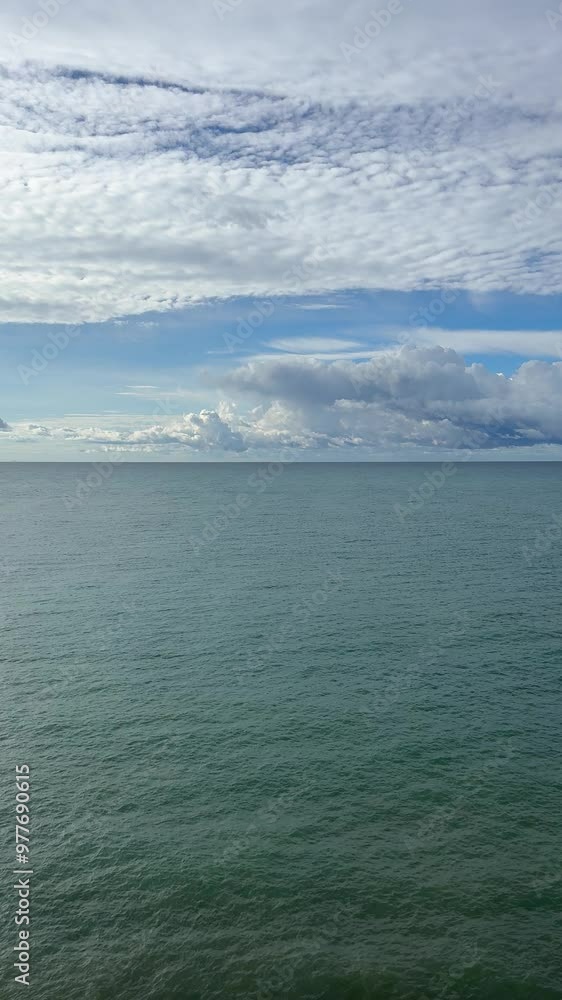 Blue calm sea and sky, vertical video. Blue calm sea and sky, vertical video.