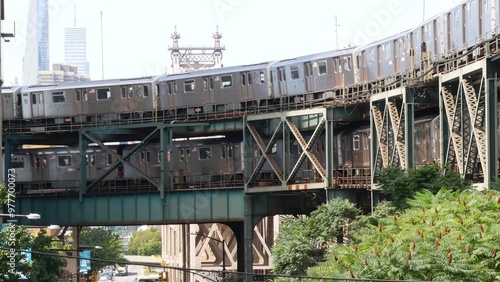 New York elevated subway, metropolitan bridge, metro track above street. Railway transport, vintage Queensboro station railroad line. Queens public train transportation. Long Island city United States photo