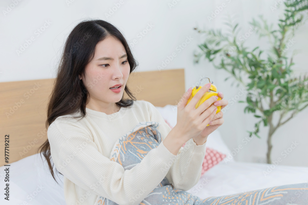 Woman with shocked face after wake up late and missed the appointment Woman with shocked face after wake up late and missed the appointment