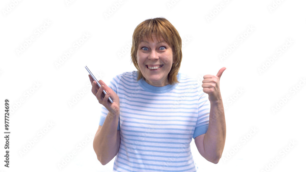 Young Woman Holding Phone and Looking Shocked at the Camera Young Woman Holding Phone and Looking Shocked at the Camera