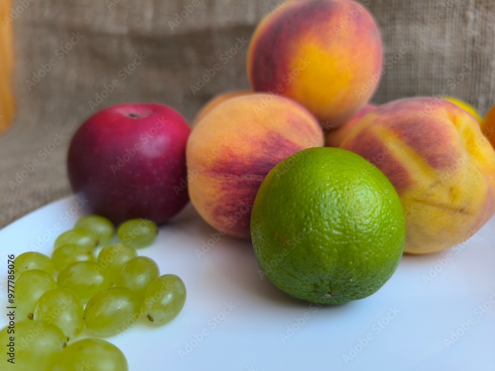 Peaches and fruits on a plate. high quality photos Peaches and fruits on a plate. high quality photos