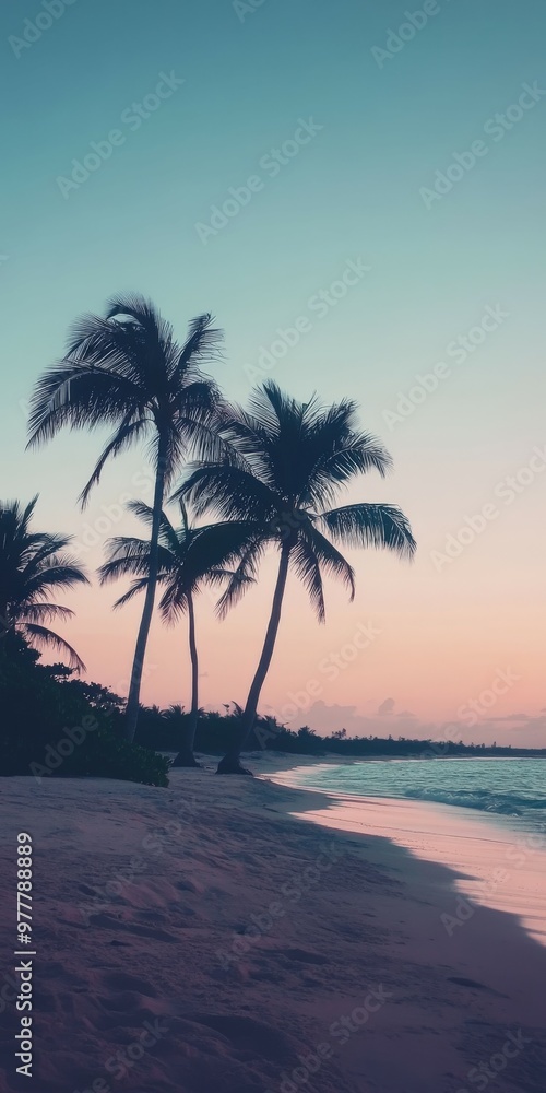 Tropical beach at dusk with palm trees swaying gently by the shore Tropical beach at dusk with palm trees swaying gently by the shore