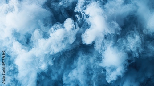 White Smoke billowing and swirling against a blue background