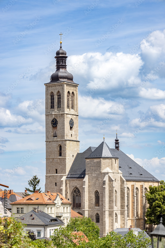 Obraz premium The Church of St James, the oldest stone church in Kutná Hora, and the spiritual centre of the entire town since it's very establishment, is located in the very heart of the medieval town