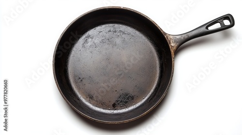 Isolated on white background, a black skillet with a fry pan design. This high-res stock image offers a clear clipping path for easy editing, making it perfect for commercial use. 