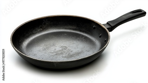 Isolated on white background, a black skillet with a fry pan design. This high-res stock image offers a clear clipping path for easy editing, making it perfect for commercial use. 