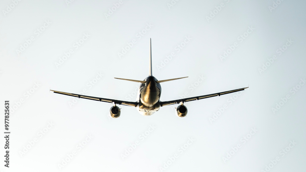 passenger airliner in the sky at sunset passenger airliner in the sky at sunset