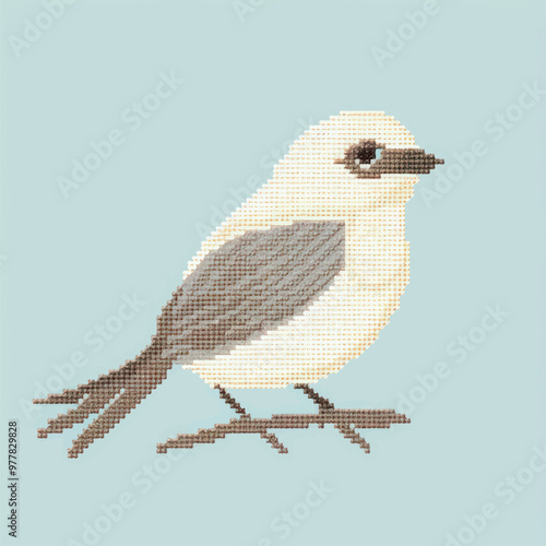 Cross-stitched bird art piece