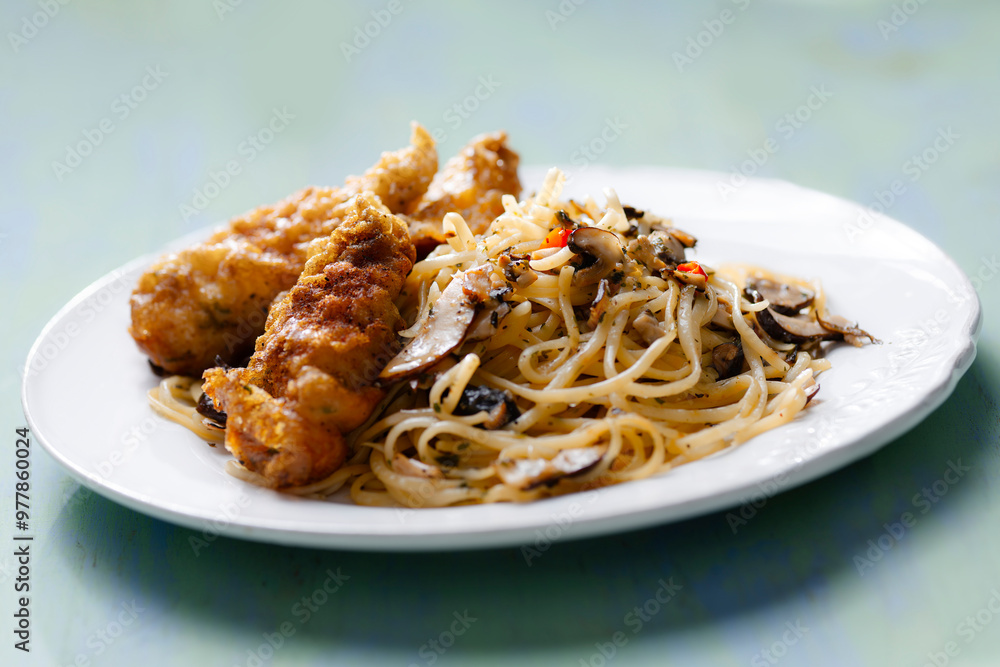 aglio olio pasta with battered fish