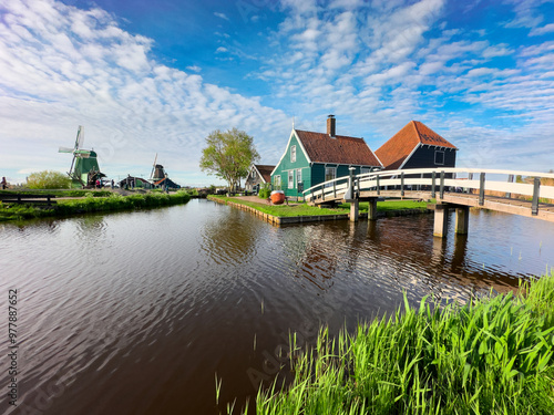 rural dutch country skyline of small old town Zaanse Schans at sunset, Netherlands at spring
