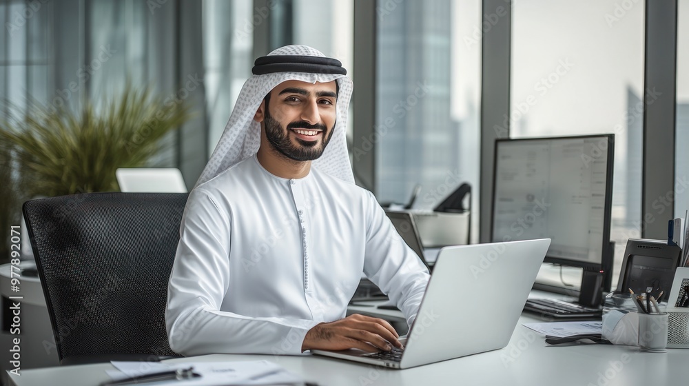 Arab Businessman Working on Laptop in Office Arab Businessman Working on Laptop in Office