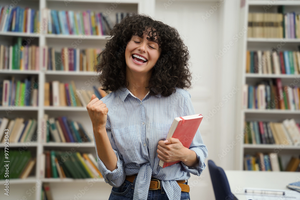 Cute dark-haired young woman looking happy and excited Cute dark-haired young woman looking happy and excited