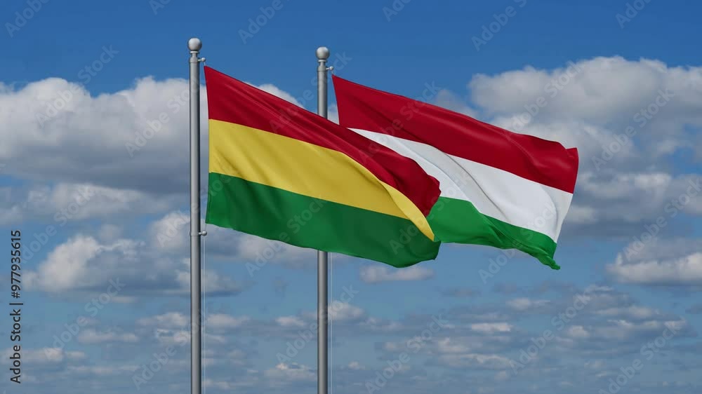 Hungary and Bolivia flags flying together, video concept of the relationship, two country relations concept Hungary and Bolivia flags flying together, video concept of the relationship, two country relations concept