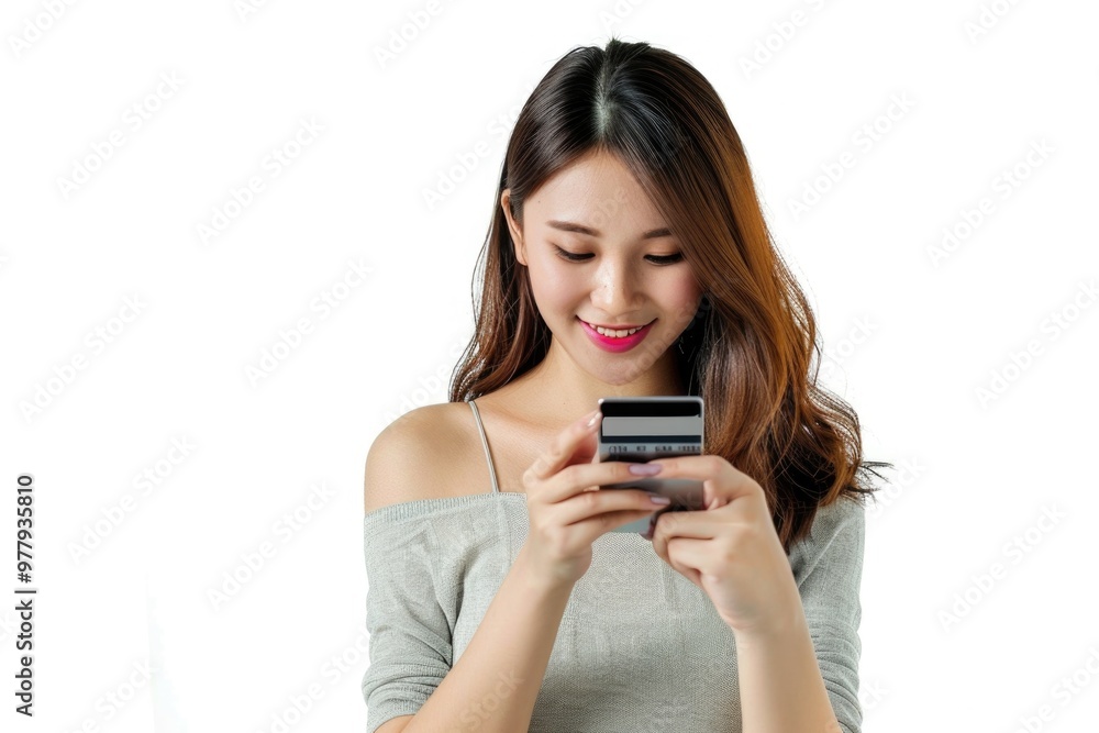 A person checking their mobile device, possibly texting or browsing A person checking their mobile device, possibly texting or browsing