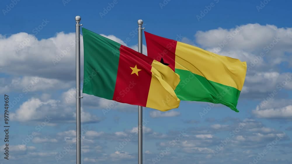 Guinea-Bissau and Cameroon flags flying together, video concept of the relationship, two country relations concept Guinea-Bissau and Cameroon flags flying together, video concept of the relationship, two country relations concept
