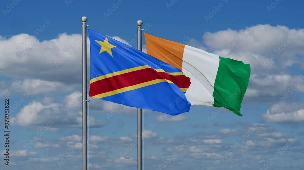 Ivory Coast or Cote d'Ivoire and Democratic Republic of the Congo flags flying together, video concept of the relationship, two country cooperation concept Ivory Coast or Cote d'Ivoire and Democratic Republic of the Congo flags flying together, video concept of the relationship, two country cooperation concept