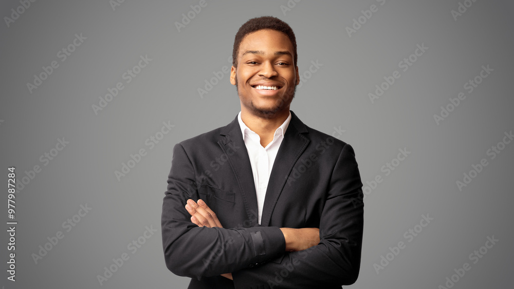 Millennial Entrepreneur. Confident afro man crossing arms, standing over white studio background. Panorama, free space Millennial Entrepreneur. Confident afro man crossing arms, standing over white studio background. Panorama, free space