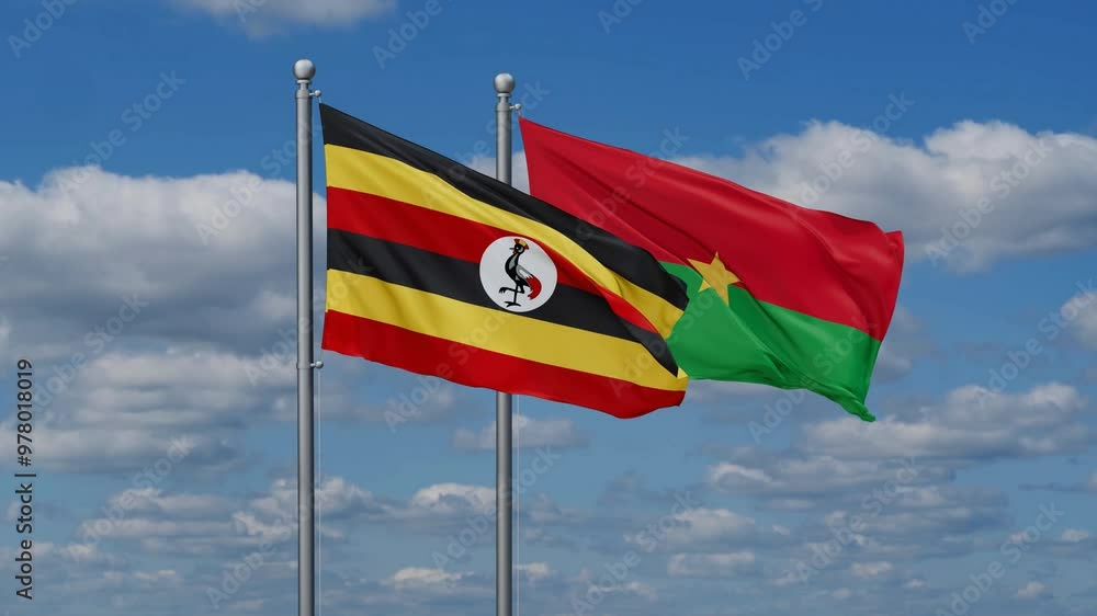 Burkina Faso and Uganda flags flying together, video concept of the relationship, two country relations concept Burkina Faso and Uganda flags flying together, video concept of the relationship, two country relations concept