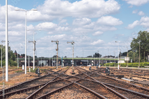 Obraz na płótnie Multiple Railroad Tracks with Junctions at a Railway Station in Wolsztyn, Wielkopolska, Poland w salonie
