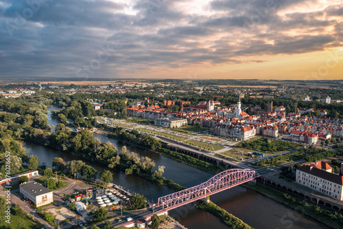 Summer aerial skyline cityscape of Głogów, Lower Silesia (Dolny Śląsk). Wide panoramic view of the old town, Bulwar Nadodrzański and Most Tolerancji bridge at sunset