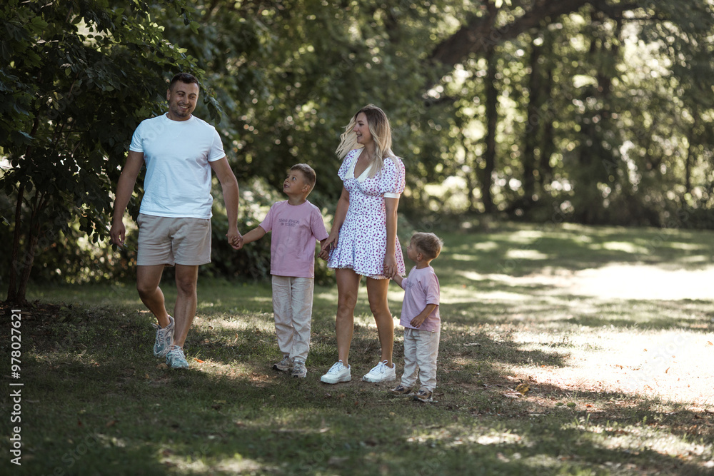 Her boys fill her life with joy. Cropped shot of a young family spending time together outdoors. Her boys fill her life with joy. Cropped shot of a young family spending time together outdoors.