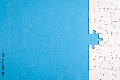 Missing piece of white jigsaw puzzle, incomplete task