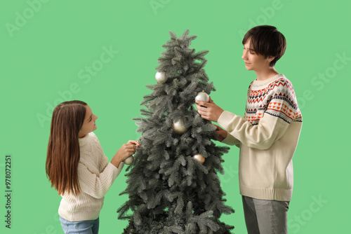 Cute girl and her brother d...
