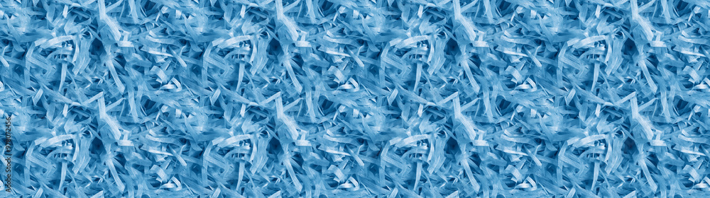 shredded paper filler in arctic blue color with thin, delicate strips, shredded paper filler texture background shredded paper filler in arctic blue color with thin, delicate strips, shredded paper filler texture background