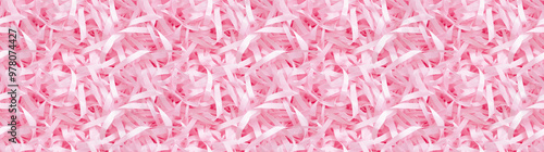 shredded paper filler in baby pink color with thin, delicate strips, shredded paper filler texture background photo