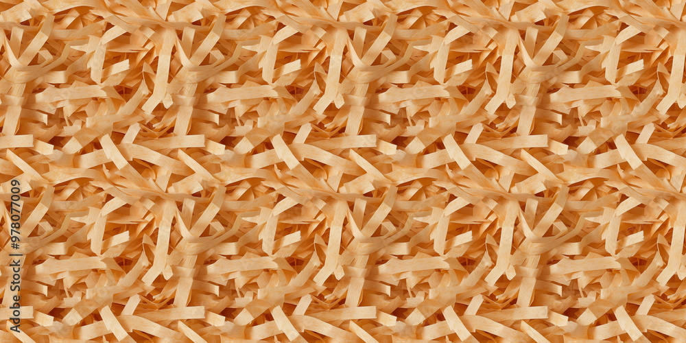 shredded paper filler in butterscotch color with thin, delicate strips, shredded paper filler texture background shredded paper filler in butterscotch color with thin, delicate strips, shredded paper filler texture background