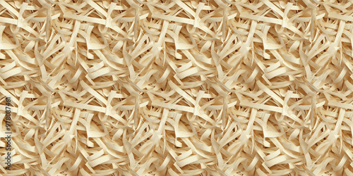 shredded paper filler in wheat color with thin, delicate strips, shredded paper filler texture background photo