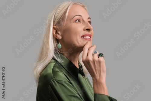 Fashionable mature woman in...