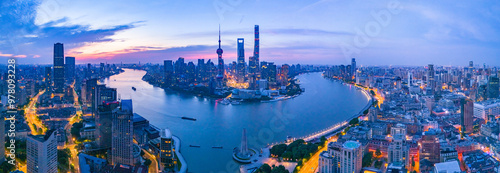 Aerial view of modern city skyline and buildings at sunrise in Shanghai