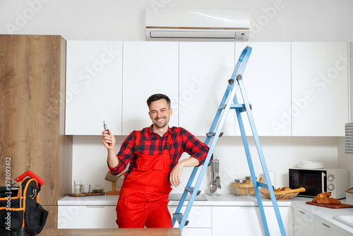 Male technician with screwd...