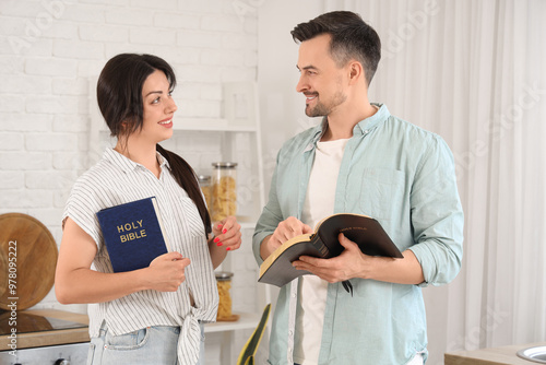 Religious couple reading Ho...