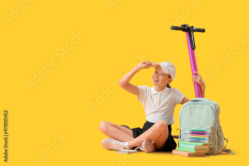Cute schoolgirl with electr...