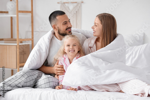 Happy parents and their lit...