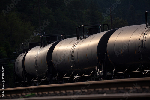 Wallpaper Mural Black tank cars cisterns for gas and oil, captured in Portland, Oregon industrial area. High quality close up picture for download. Torontodigital.ca