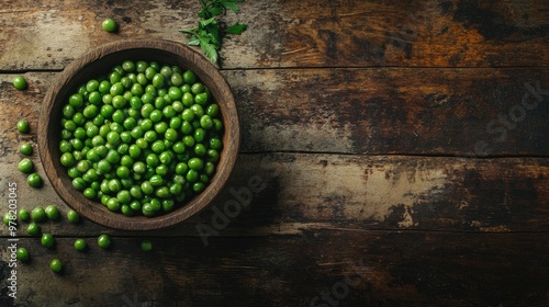 Top view of a bowl of green peas on a rustic wooden table featuring an oil painting style and ample copy space Flat lay composition with natural wooden elements photo