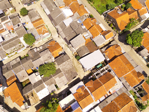 A group of house roofs from an aerial perspective. Settement on countryside. Drone point of view. Housing Problems. Social Issues.
Aerial Photography Concepts photo