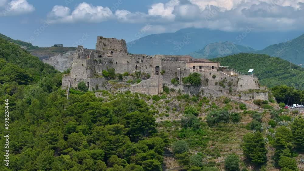 Aerial: drone flying at old medieval abbey perched on mountain top, at sunrise. Italy, Top of the Mountain and Castle, architectural monument, aerial view castle old , Europe Aerial: drone flying at old medieval abbey perched on mountain top, at sunrise. Italy, Top of the Mountain and Castle, architectural monument, aerial view castle old , Europe
