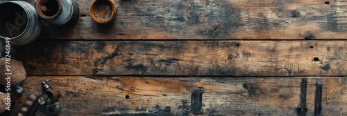 Rustic wooden table with pottery and stones, evoking a natural and artisanal vibe.