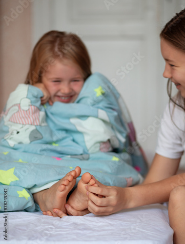 Tickled feet. Image with selective focus 