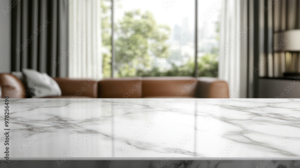 A marble countertop in a modern living room with a view of greenery outside. A marble countertop in a modern living room with a view of greenery outside.