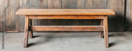 Vintage wooden workshop bench with stains and cuts, characterrich and detailed photo