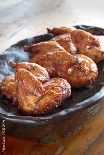 pieces of roast chicken, known in Brazil as galeto on the plate