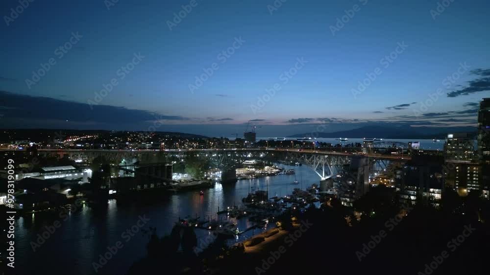 A beautiful drone shot of the Granville bridge at night. A beautiful drone shot of the Granville bridge at night.