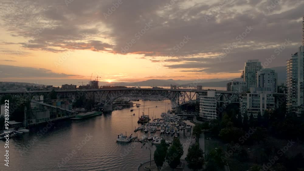 A Twilight shot of the Vancouver Waterfront with Granville Bridge on the Horizon A Twilight shot of the Vancouver Waterfront with Granville Bridge on the Horizon