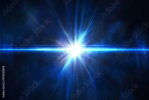 Various abstract rays of light emanating from a bright glowing center point against a dark background photo